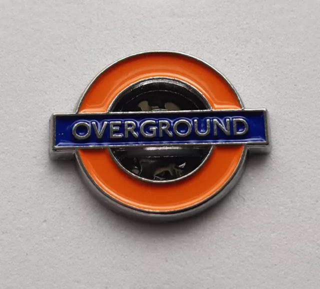 https://www.picclickimg.com/UxUAAOSwnqZkVV8P/Overground-London-Underground-Tube-Enamel-Lapel-Pin-Badge.webp
