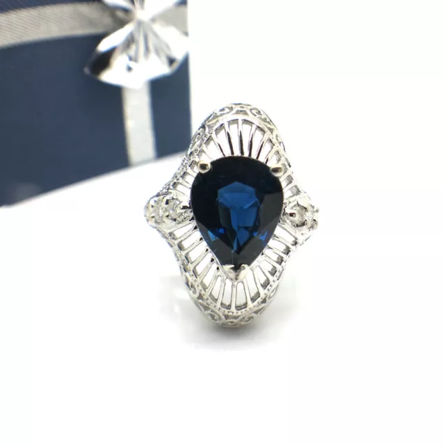 14k white gold pear shape sapphire and diamond ring