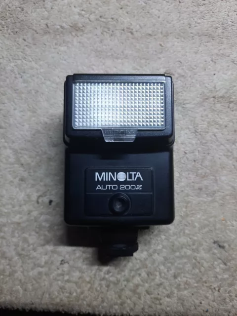 Minolta Auto 200X Flash Unit 946 D With A Leather Case