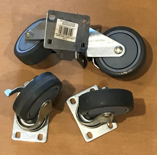 Nice used 4-PK 4 in. Gray Rubber Like TPR & Steel Swivel Plate Caster Wheel 