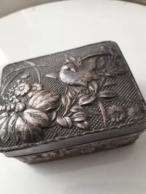 Antique white metal embossed snuff box