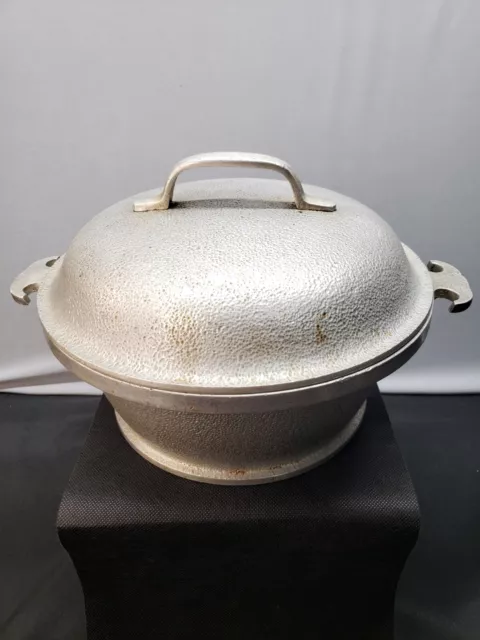 https://www.picclickimg.com/U~EAAOSw621lAKR9/Vintage-Hammered-Aluminum-Pot-Dutch-Oven-With-Lid.webp