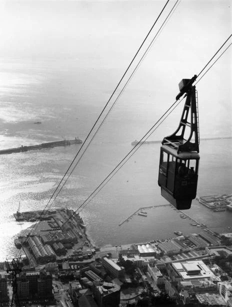 CABLE CAR DESCENDS from 'The Rock' fine view Gibraltar harbour below ...