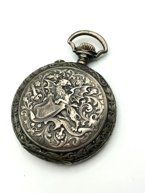 Rare superbe montre à gousset Longines en Argent massif décor de dragon