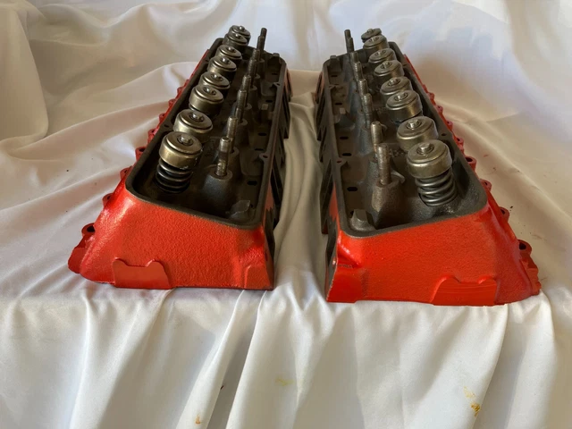 A pair of reconditioned Chevy 461 camel hump heads, unaltered, dated 12/1965