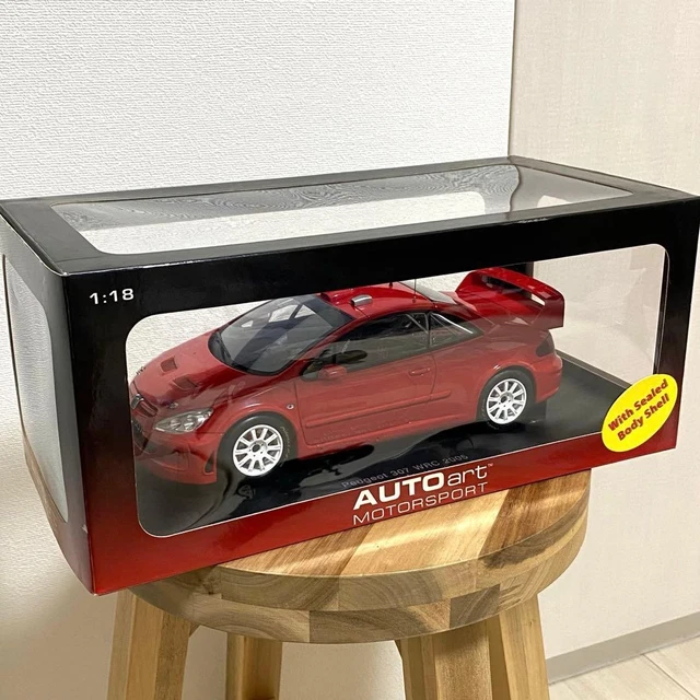 Voiture Miniature Peugeot 307 WRC grise et jaune numéro 1 Voiture Miniature Peugeot 307 WRC grise et jaune numéro 1