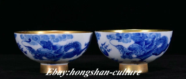Qianlong Paire de bols en porcelaine bleue blanche et dorée du palais Dragon