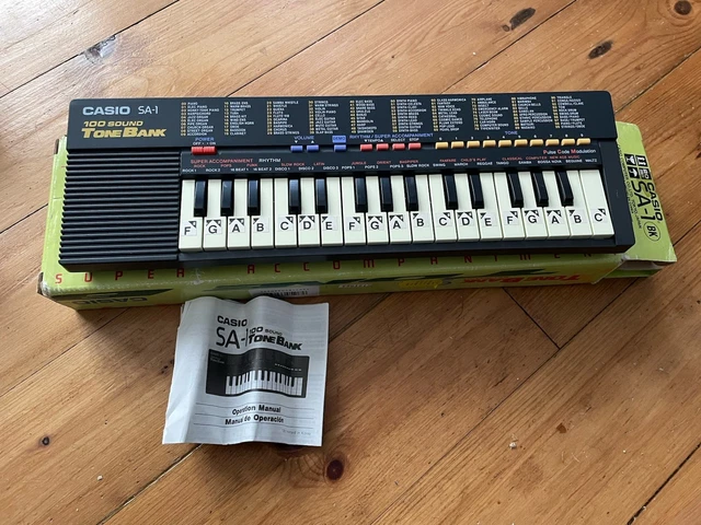 CASIO SA-1 TONE Bank mini keyboard, 100 Sound Tonebank, with box