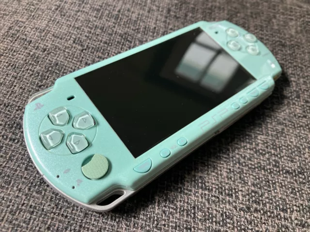 light blue psp-2000 SEE PHOTOS FOR CONDITION