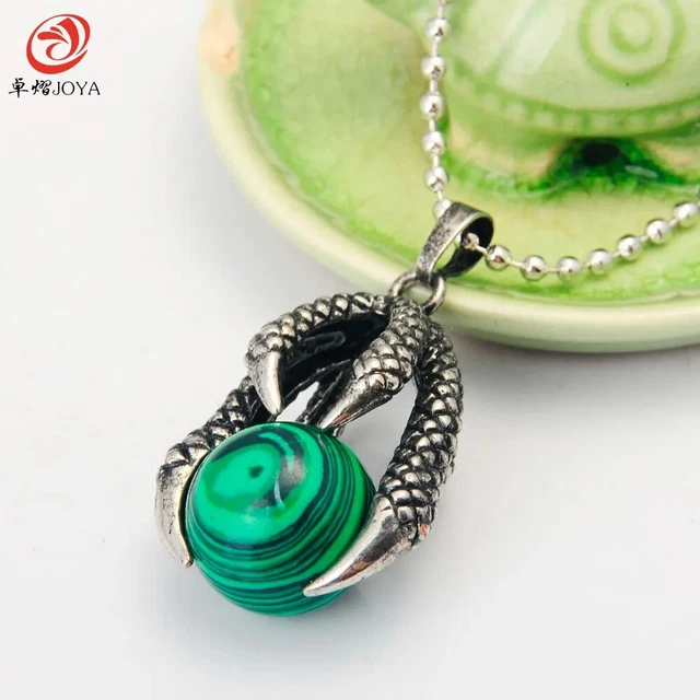 Intricately Designed Silver Accessories: Dragon Claw & Peacock Stone Ball