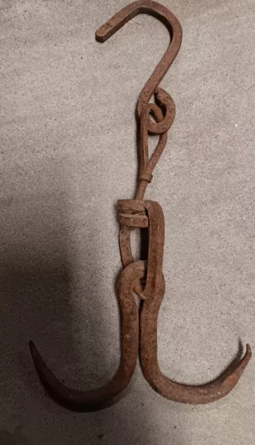 A Primitive Hand Wrought Hook And Assembled  Old Setup For A Meat Hook