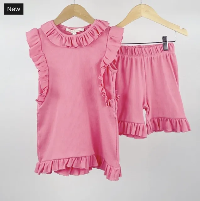 Older girls pink ruffle shorts outfit