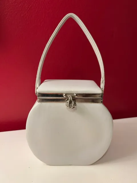 Vintage white leather handbag, unique square-round shape with decorative clasp 