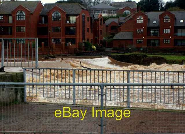 Photo 6x4 River Exe at Trews Weir Exeter The River Exe in flood thunderin c2008