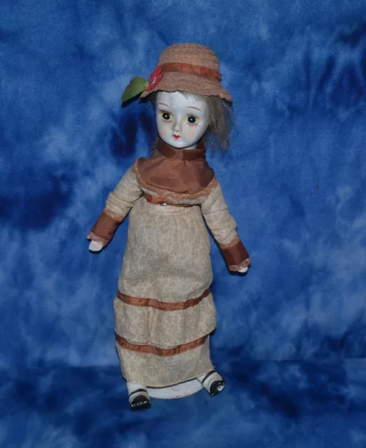 Vintage Antique Porcelain Head Arms Legs And Feed Cloth Body Doll