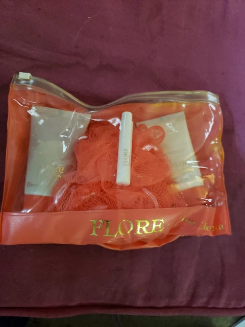 Carolina Herrera FLORE Eau de Perfume Vial Shower Gel,Body Lotion 1.7oz Poof Bag