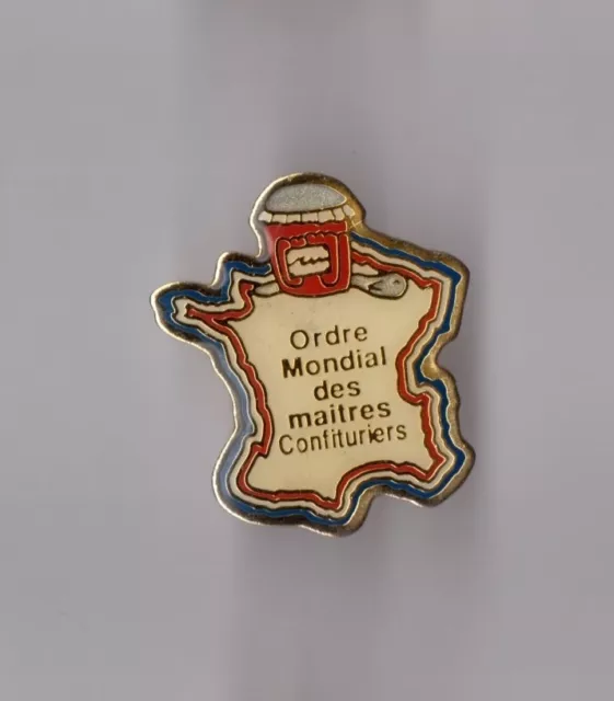 Pin's ordre mondial des maitres confituriers (époxy numéroté n° 0369)