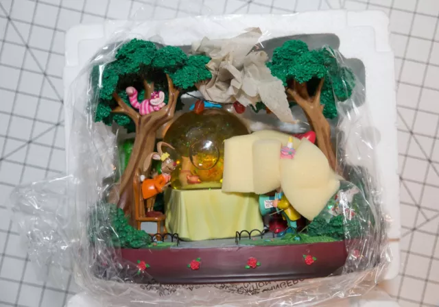 DISNEY Alice in Wonderland Snow Globe Music Box Figure NRFB BRAND NEW Unbirthday DISNEY Alice in Wonderland Snow Globe Music Box Figure NRFB BRAND NEW Unbirthday