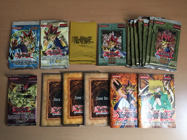 Lot de 12 boosters vides, 3 tapis et 2 notices Yu-Gi-Oh!