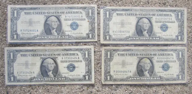1957 B *Note* One Dollar Silver Certificate Blue Seal. Well Circulated. lot of 4