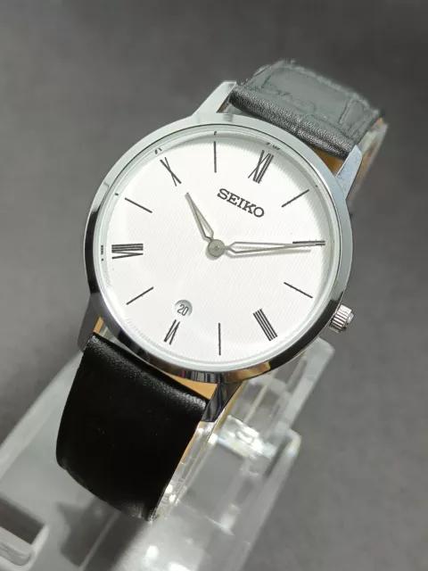 Seiko Slim Quartz Date Men's Wrist Watch Japan Made-Roman Numeral Dial