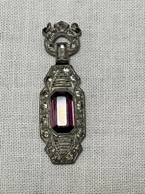 Art Deco large rectangular purple and clear early rhinestone articulated pendant