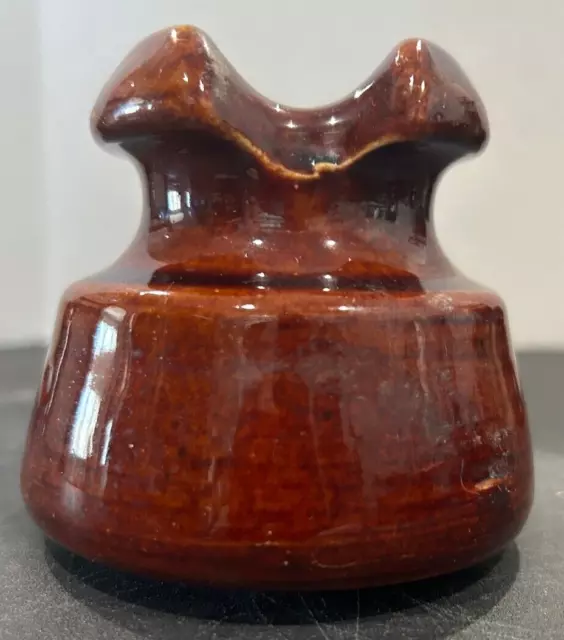 FF Unmarked brown porcelain insulator approx 3.5" dia x 3.5" tall