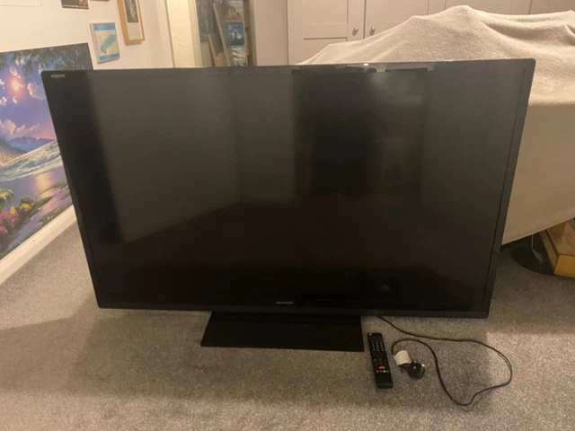 SHARP 60 INCH LCD TV with stand and remote used but in very good