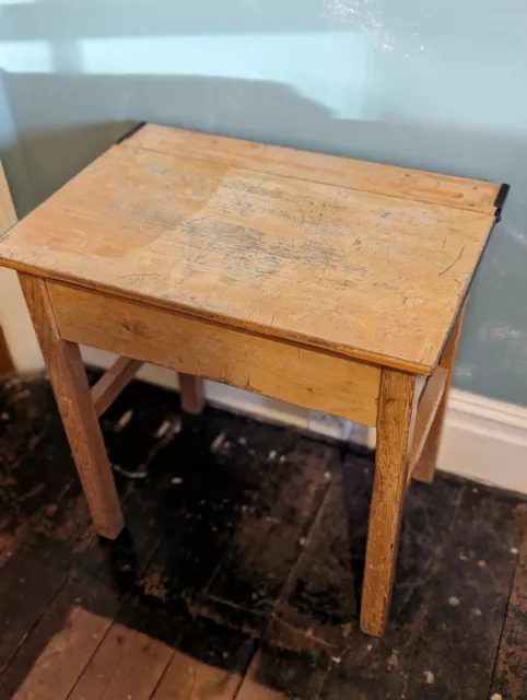 Vintage old wooden school desk