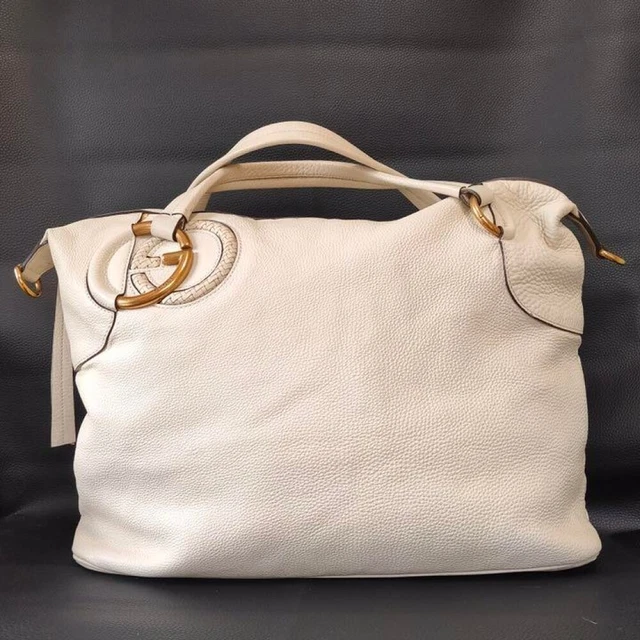 Cream hotsell gucci bag
