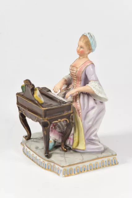 Beautiful Antique figurine of Sitzendorf Dresden Woman playing the piano 19th C