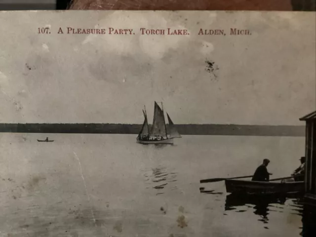 A Pleasant party Torch Lake 1909 Boat Sailboat Boathouse. Awesome Bw RPPC