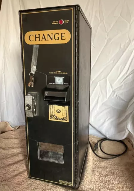 American Changer Model AC1001 changes $1 / $20 bills to quarters