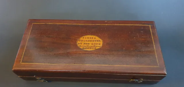 Mahogany cased Sikes Hydrometer with slide rule and hard-bound spirit tables