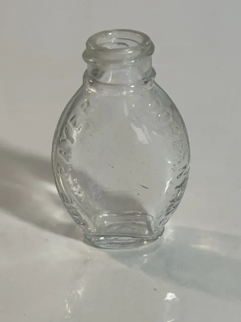 VINTAGE 2.5" glass The Bayer Company embossed shoulders  bottle