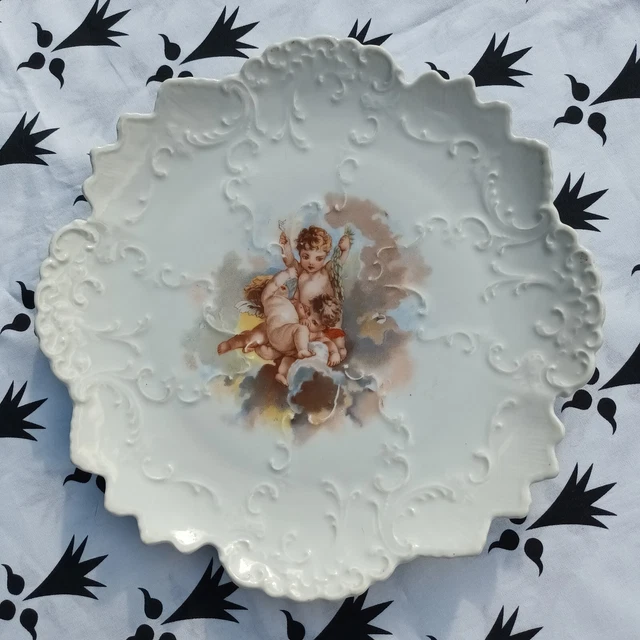 ASSIETTE ANCIENNE DE collection en porcelaine de Limoges ange angelot