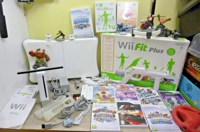 wii bundle with 9 games wii motion plus wii fit all tested and working
