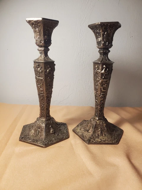 Pair Of Antique Silver Plate Candlesticks Repousse Dutch Scene by W.B. MFG Co