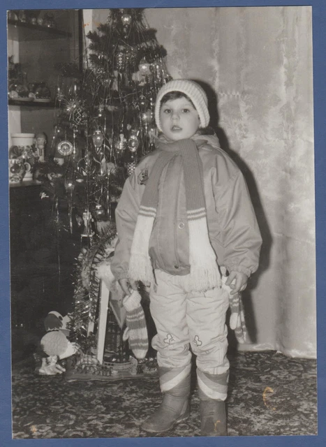 Girl in winter clothes near the Christmas tree at home Soviet Vintage Photo USSR
