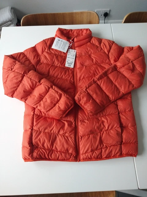 Uniqlo Cappotto Tampone Pioggia Arancione Età 13 Taglia Bambini Primavera Ragazze Unisex