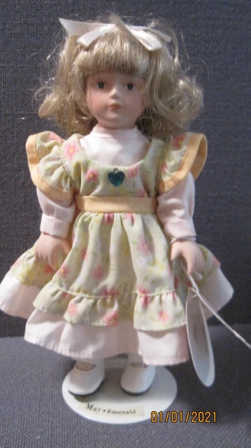 Russ Berrie Porcelain Doll of the Month May Emerald "Emmie", With Stand