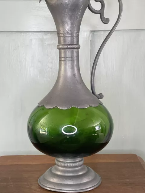 A French Art Nouveau Ewer With A Green Glass Body