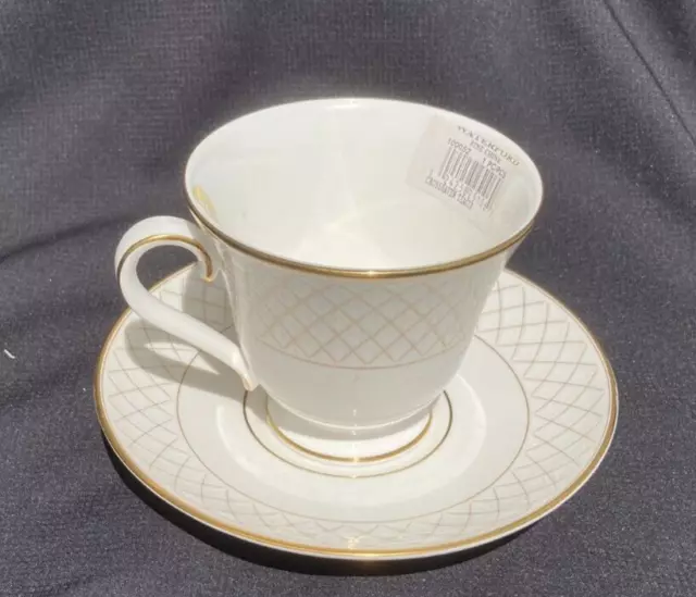 WATERFORD CROSSHAVEN CHINA Gold Cup and Saucer Set. NEW with labels.