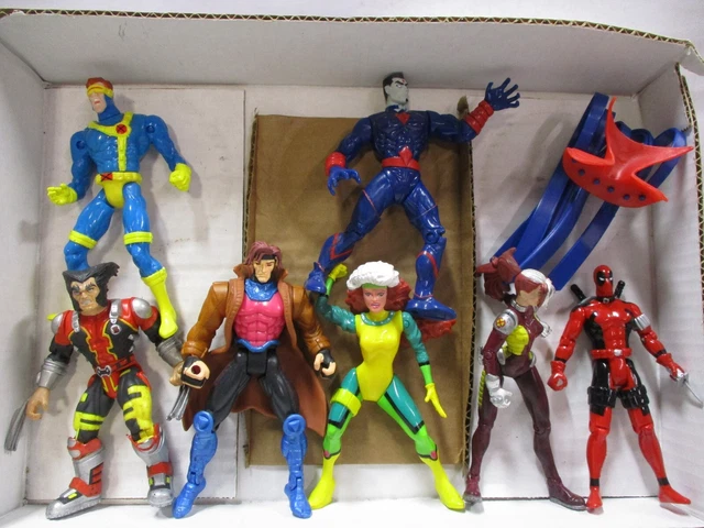 7 1990's Marvel Action Figures Wolverine, Gambit, Deadpool
