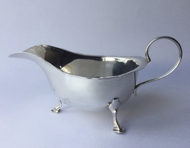 SOLID SILVER SAUCE BOAT HALLMARKED BIRMINGHAM 1928. A J Zimmerman.