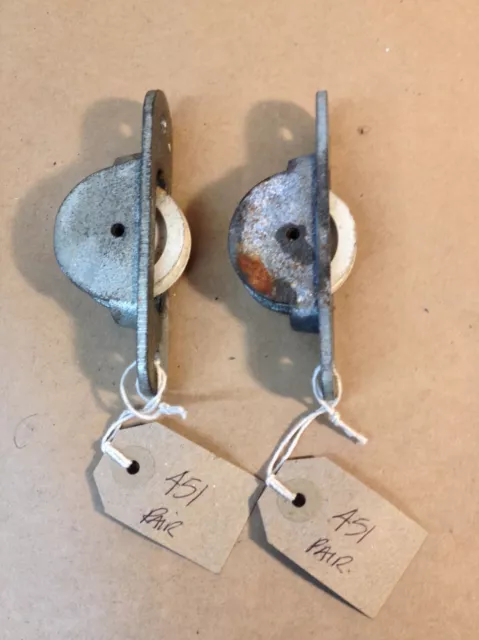 (451) A Pair Of Salvaged Sash Window Opening Pulleys Iron With Nylon Pulleys