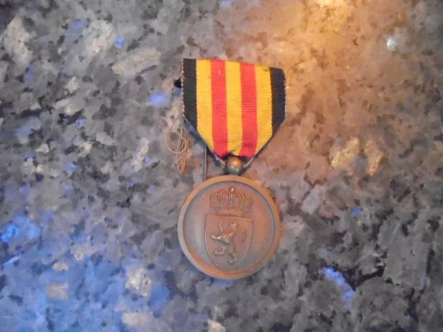 belle  medaille militaire belge origine??