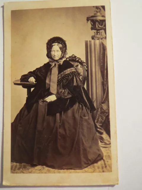 Munich - sitting old woman in a mature skirt - hood - approx. 1860/70s / CDV