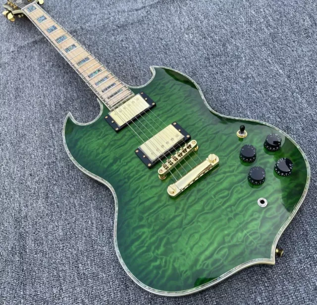 Customized Trans Green Quilted Mape Top Electric Guitar Maple Fingerboard New