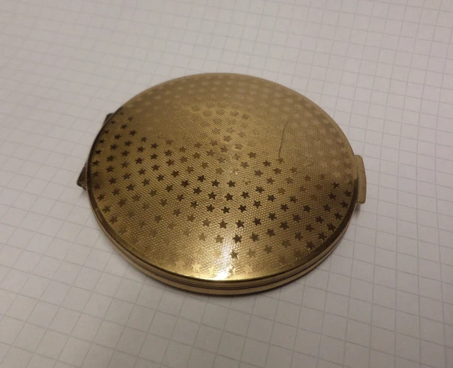 Puderdose, von Stratton. Goldfarbig.
